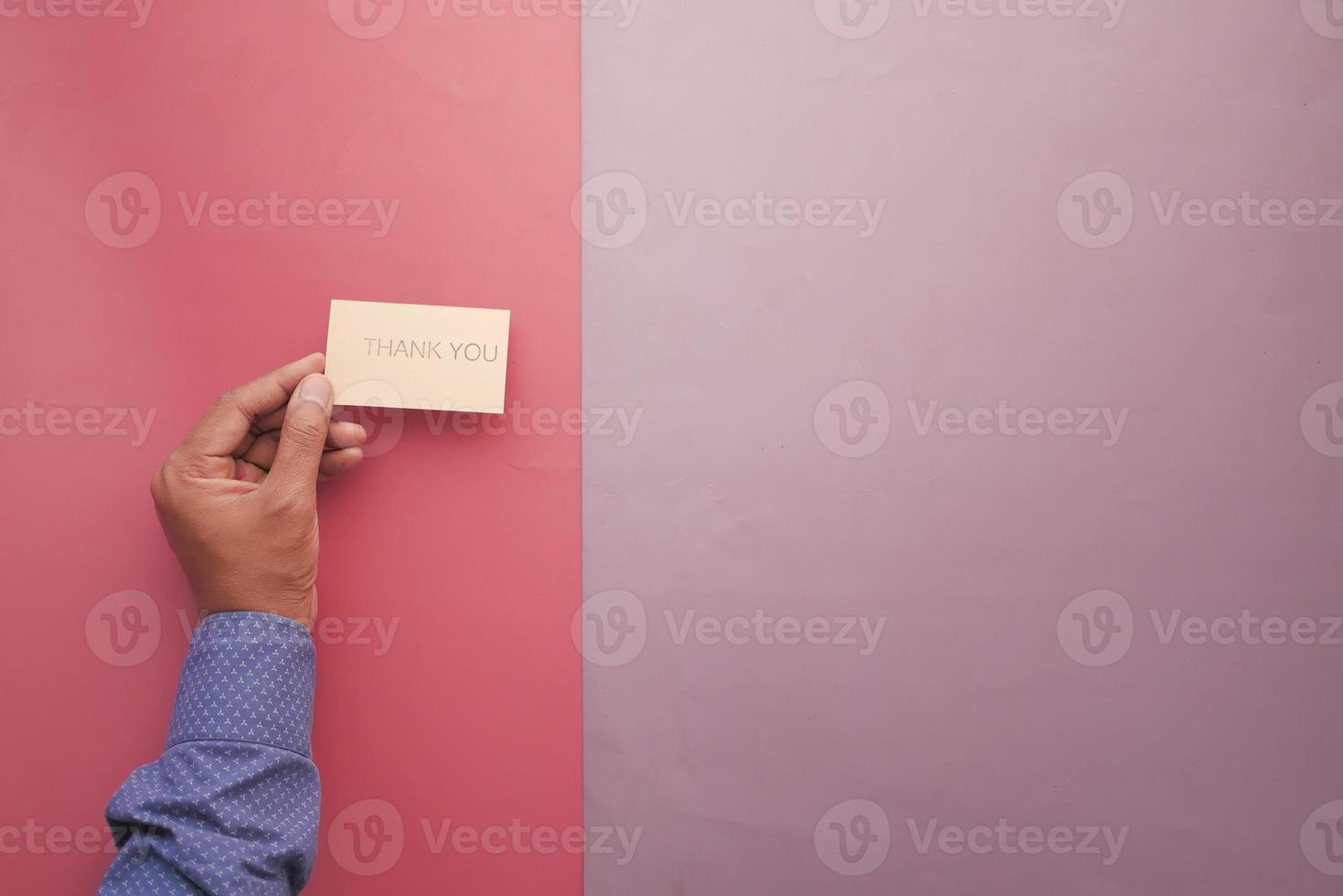 top view of holding a thank you card photo