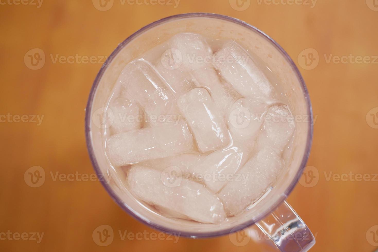 ice cube i n a soft drink top view photo