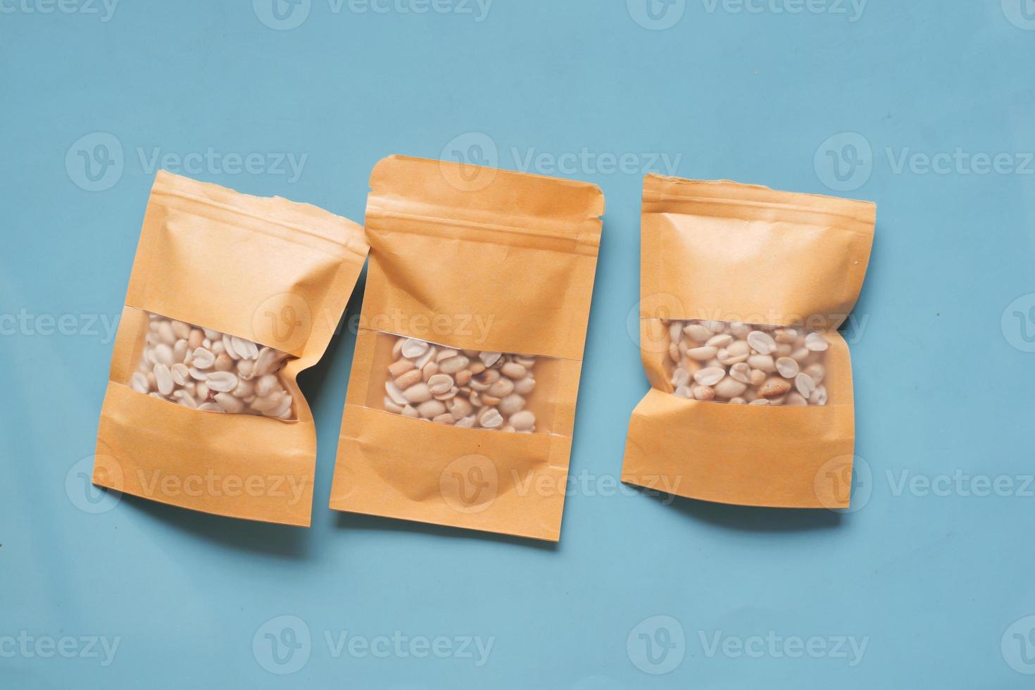 top view of peanuts in a packet on table photo