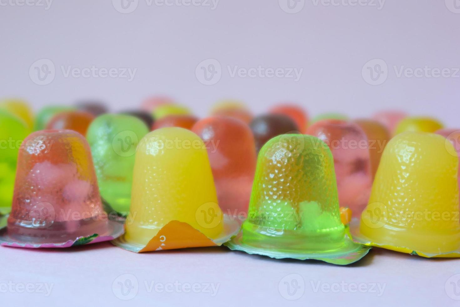 close up of colorful jelly in a plastic packet photo