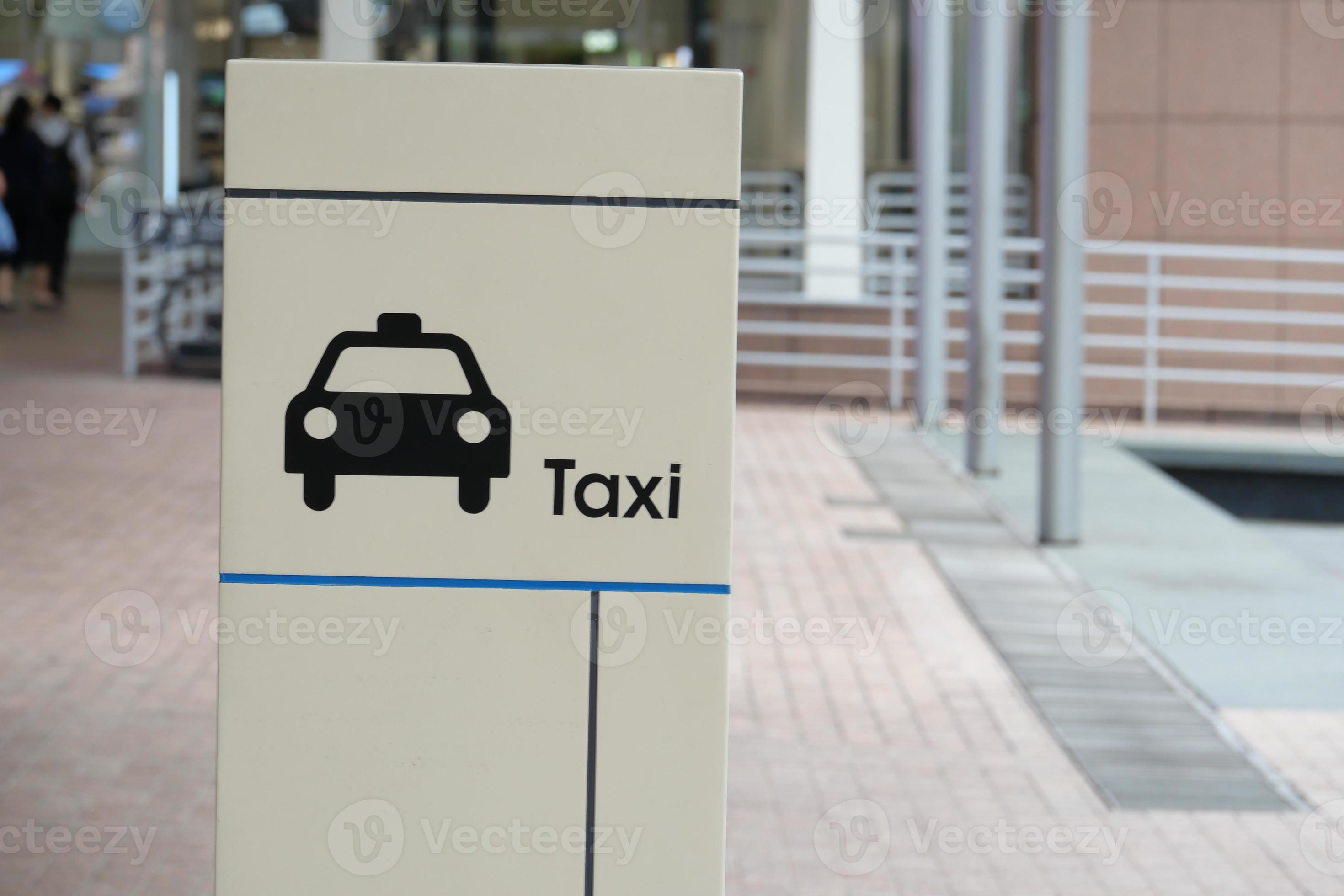 taxi stand sign on black in singapore 16555101 Stock Photo at Vecteezy