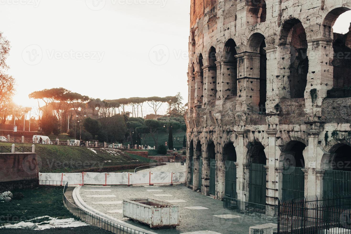 Rome, Italy, the Colosseum is an old ancient building of the battle of gladiators. photo
