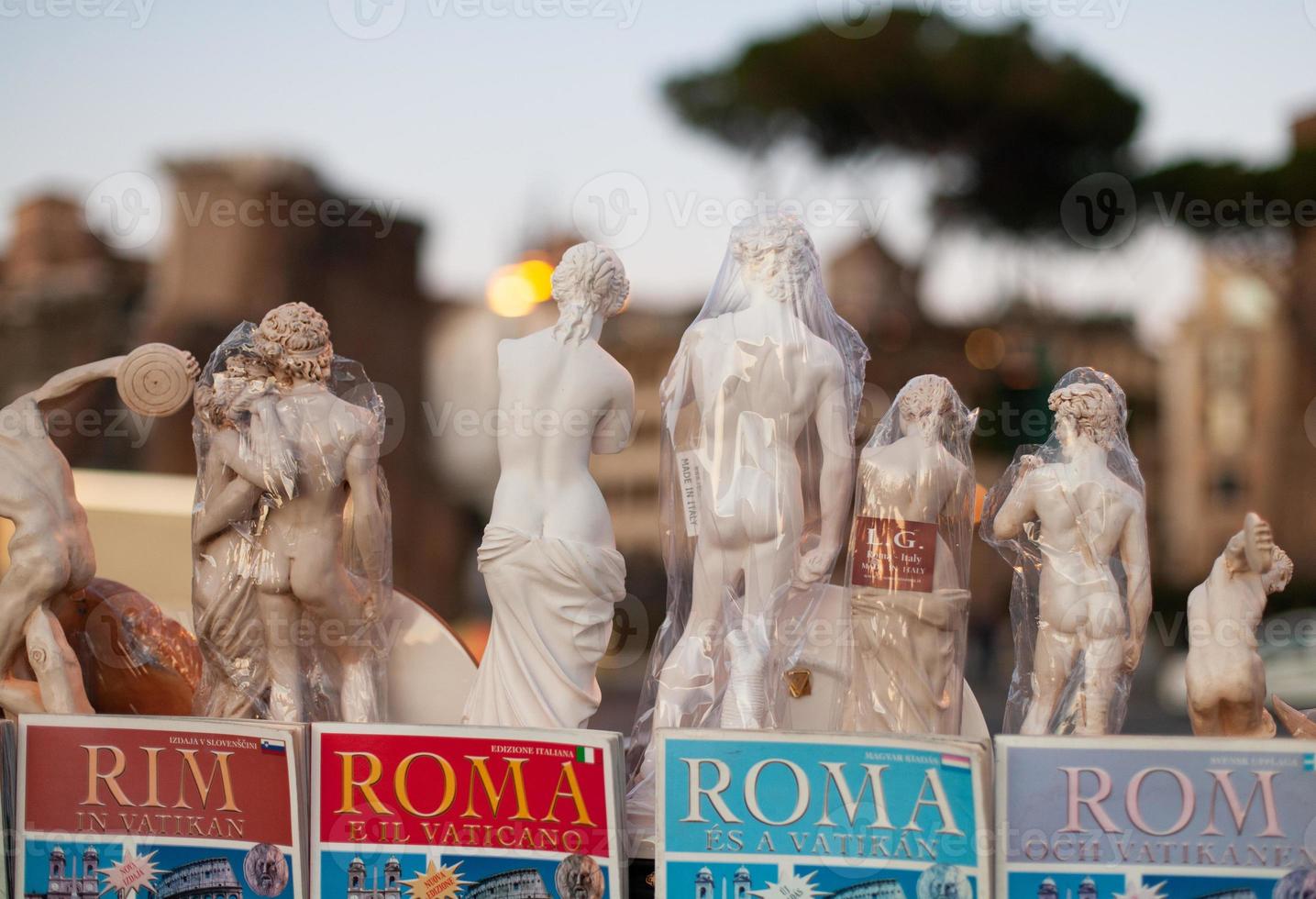 Naked sculptures are sold as souvenirs in Rome, Italy. photo