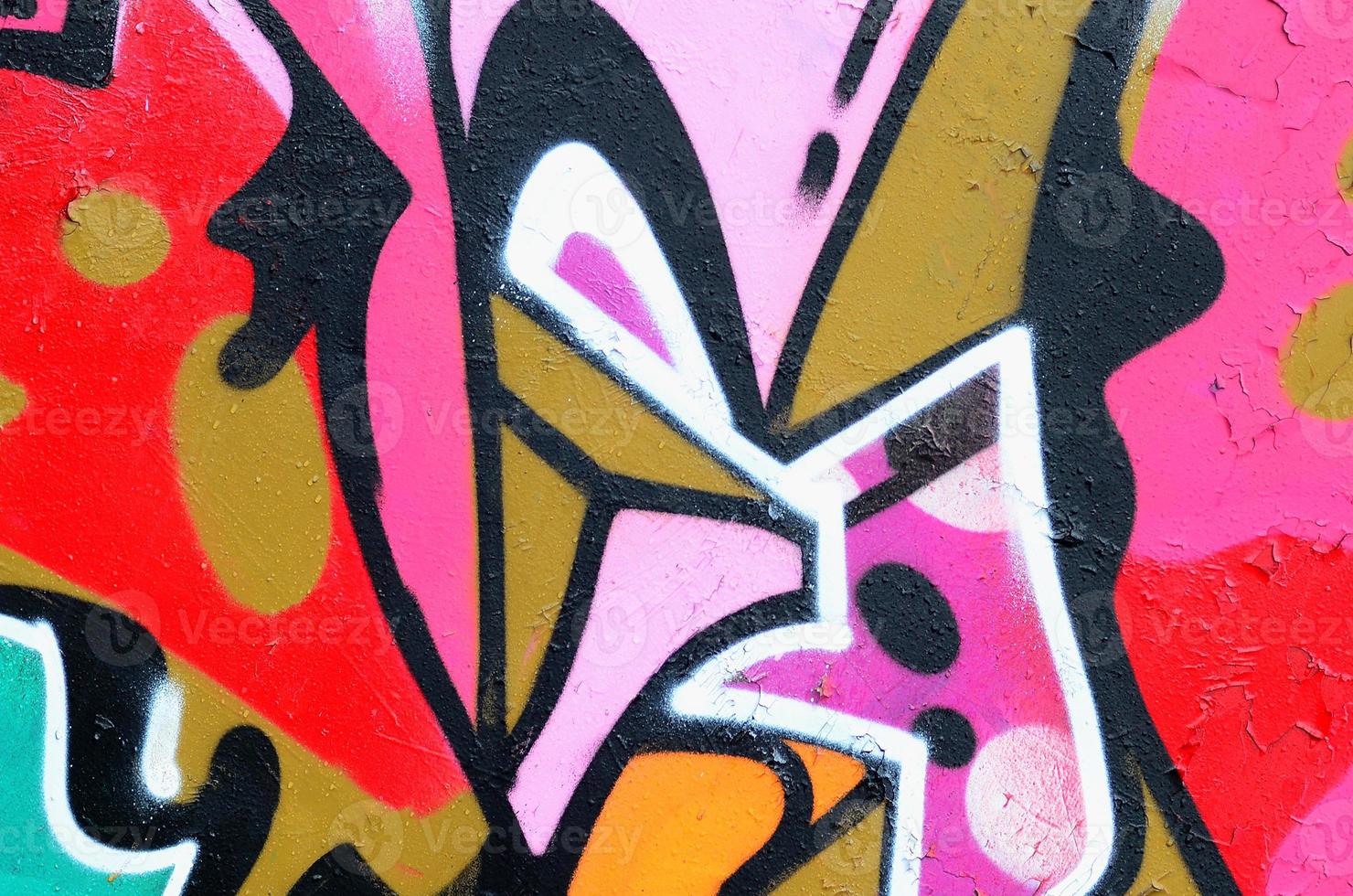 Fragment of a beautiful graffiti pattern in pink and green with a black outline. Street art background image photo