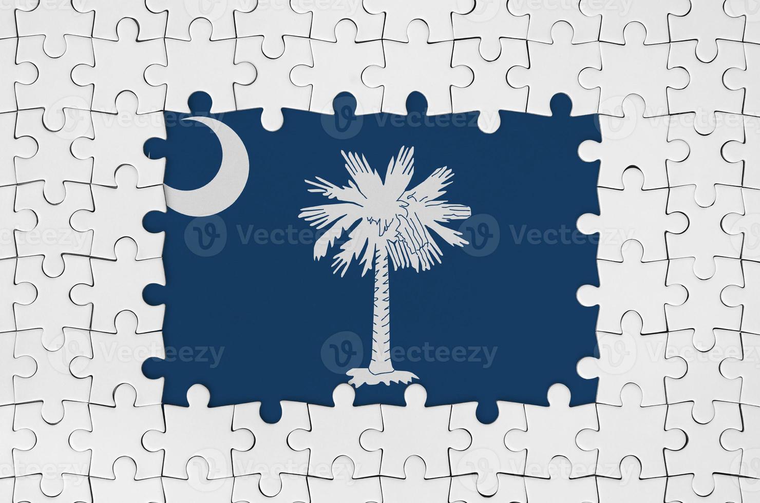 South Carolina US state flag in frame of white puzzle pieces with missing central part photo