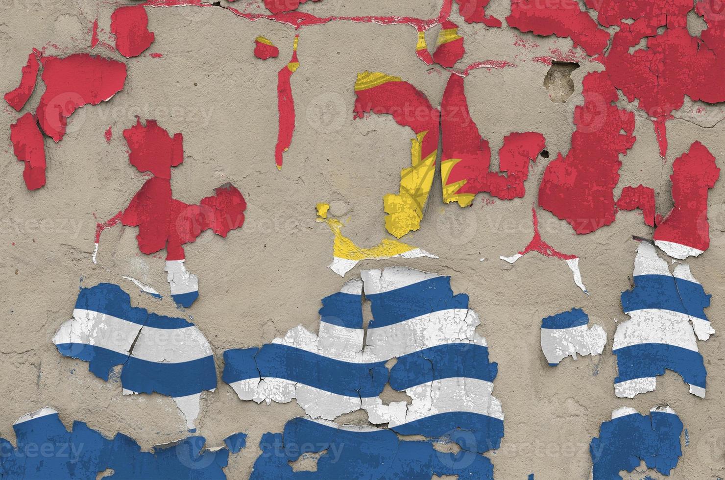 Kiribati flag depicted in paint colors on old obsolete messy concrete wall closeup. Textured banner on rough background photo