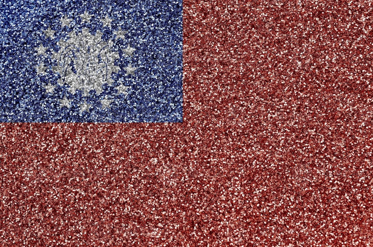 Myanmar flag depicted on many small shiny sequins. Colorful festival background for party photo