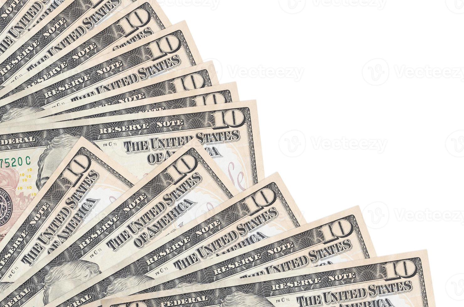 10 US dollars bills lies isolated on white background with copy space stacked in fan close up photo