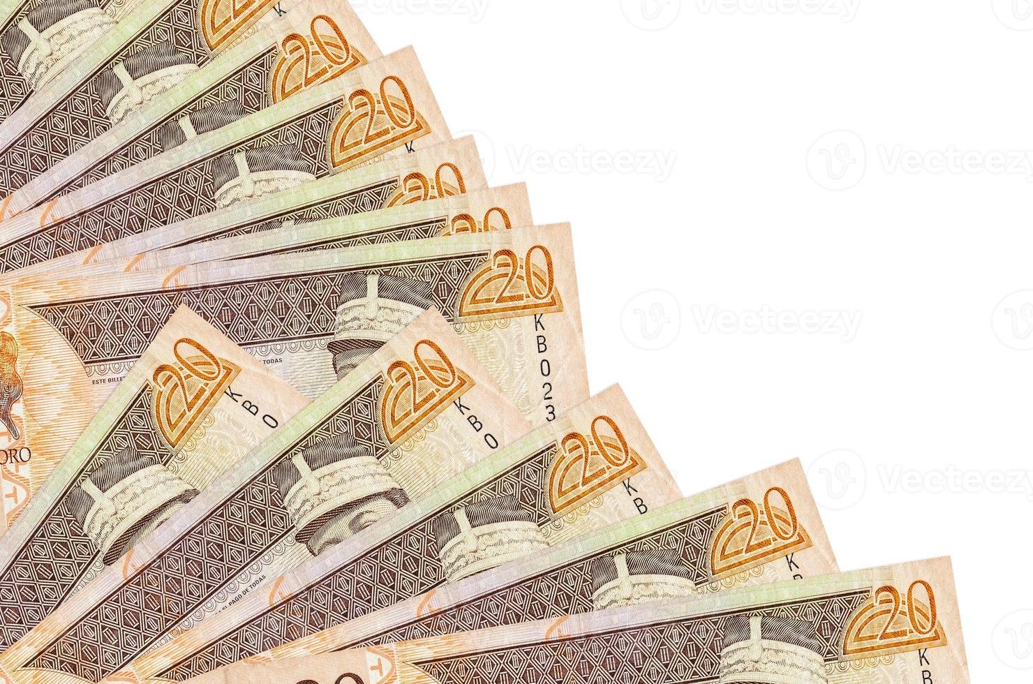 20 Dominican peso bills lies isolated on white background with copy space stacked in fan close up photo