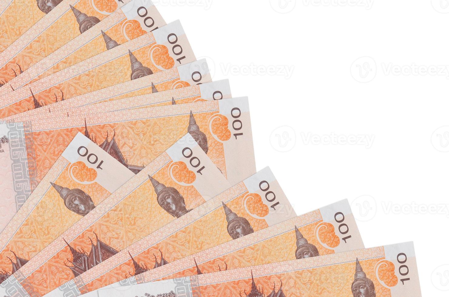 100 Cambodian riels bills lies isolated on white background with copy space stacked in fan close up photo