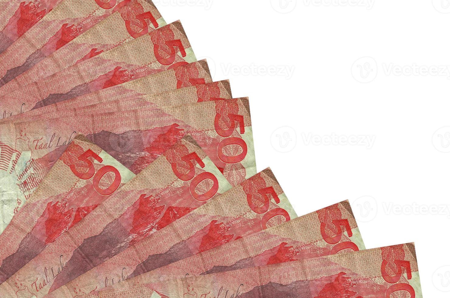 50 Philippine piso bills lies isolated on white background with copy space stacked in fan close up photo