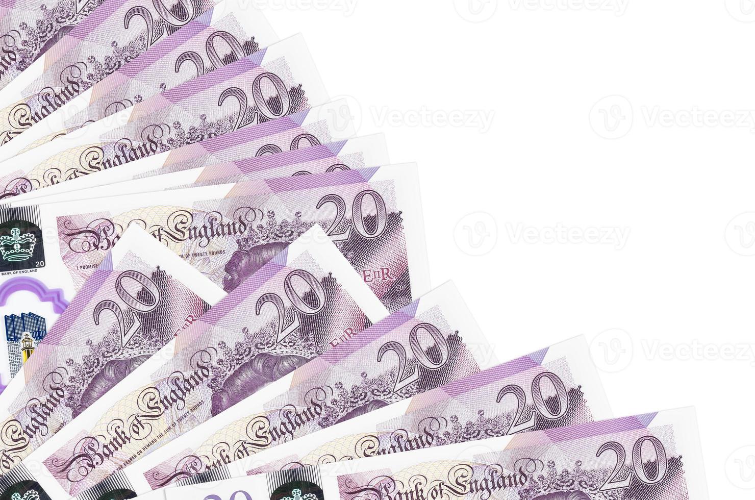 20 British pounds bills lies isolated on white background with copy space stacked in fan close up photo