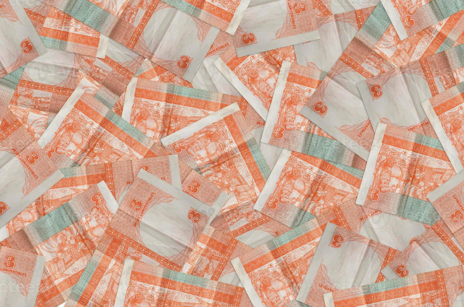 3 cuban pesos convertibles bills lies in big pile. Rich life conceptual background photo