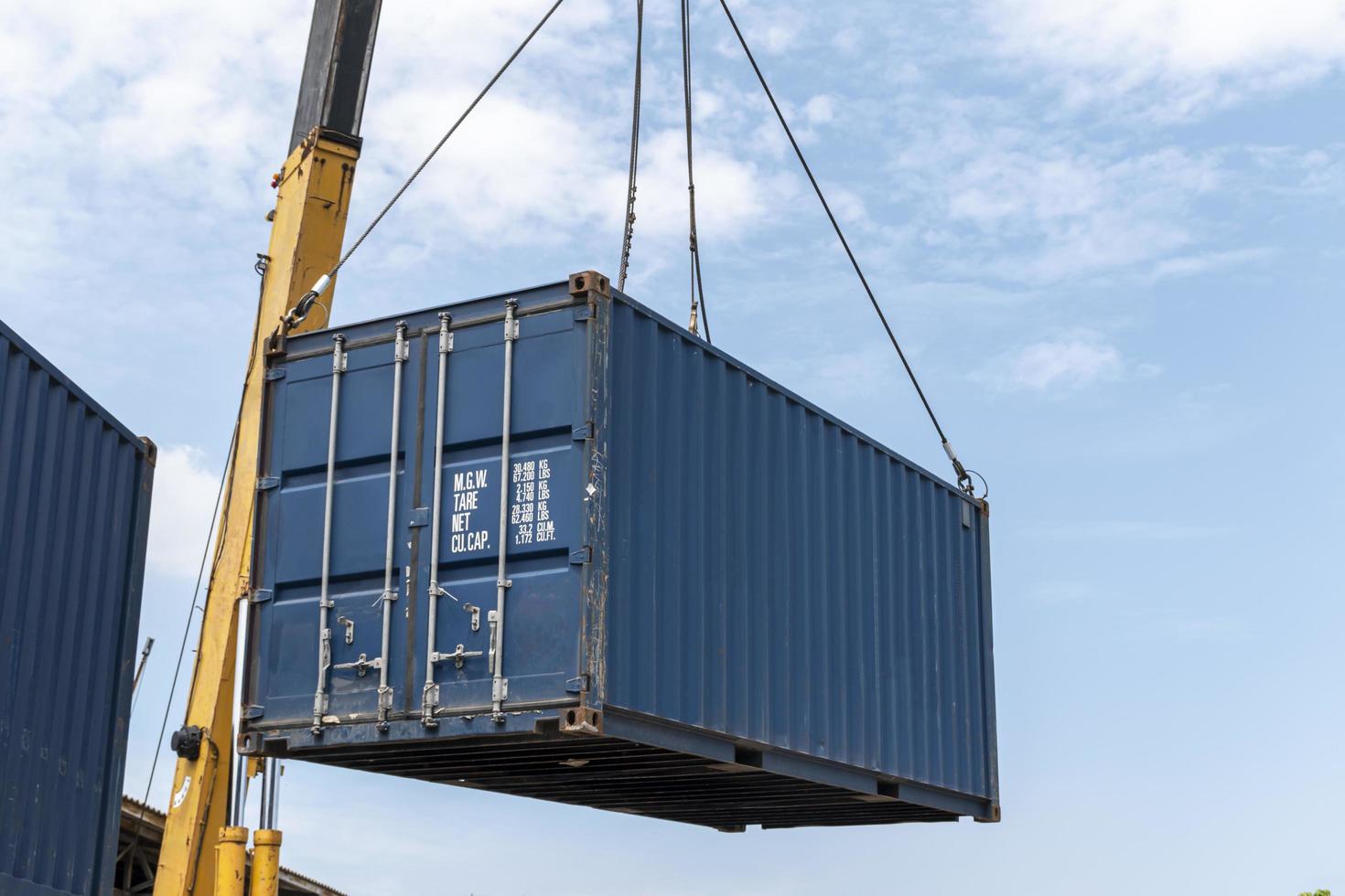 Crane lifting up container loading photo