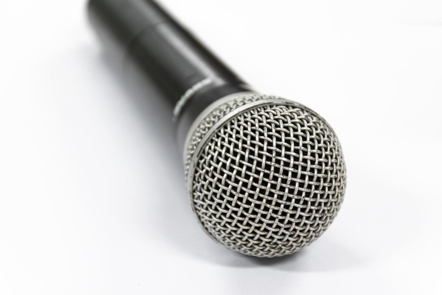 Close up microphone on white background photo