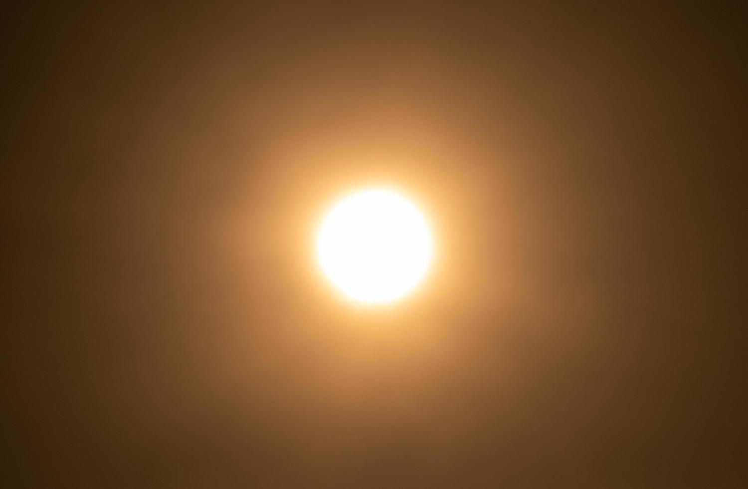 The sun on the yellow sky blur focus photo