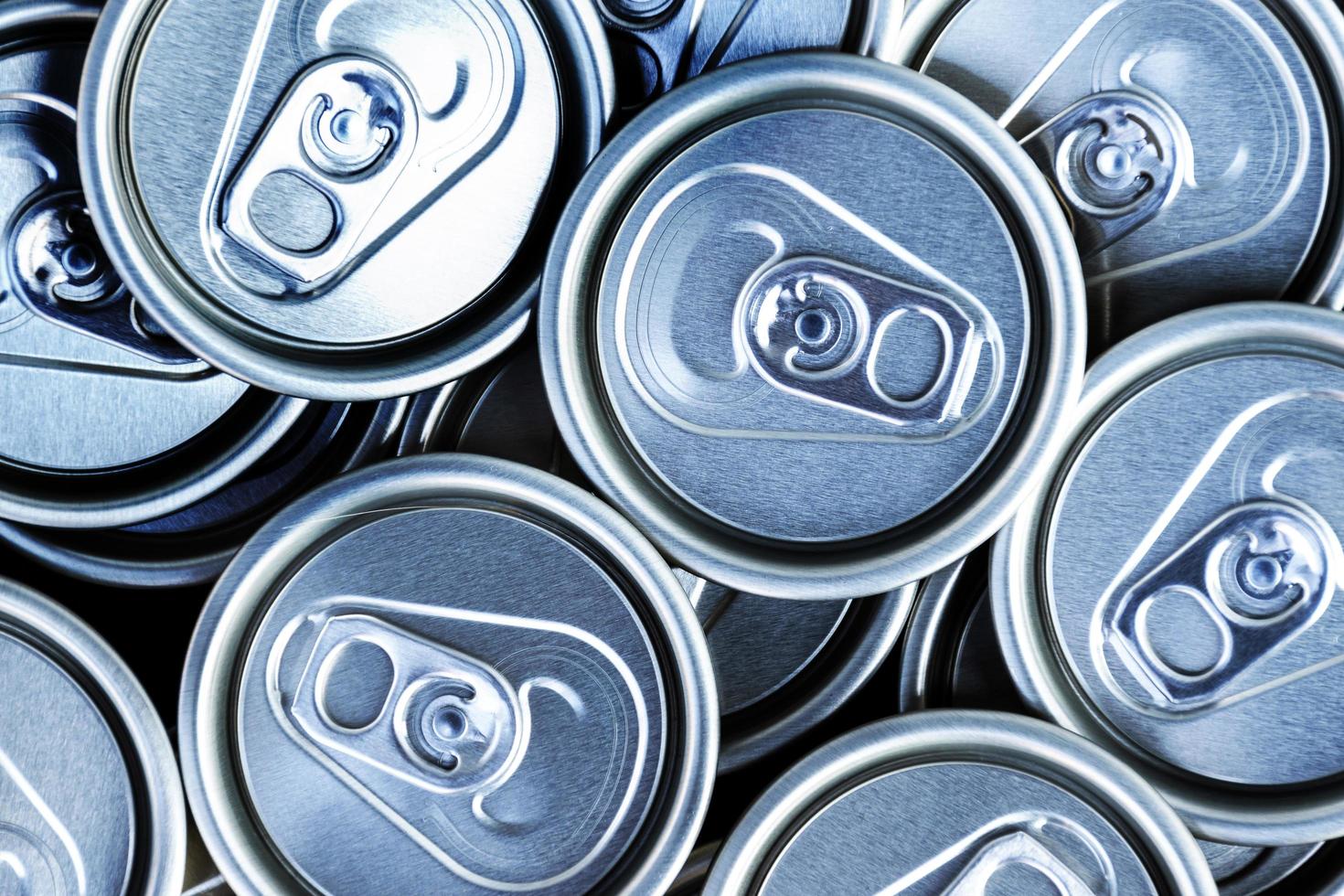 Close up aluminum can lids used for containing beverages photo