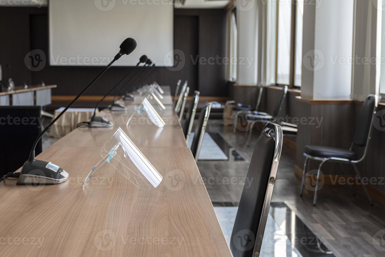 Brown chair and tabler row in meeting room photo