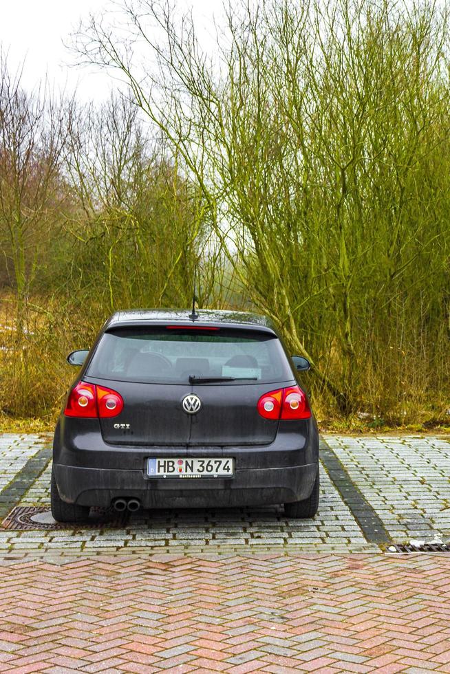 Bremerhaven Bremen Germany 2011 Black noble VW Volkswagen Golf GTI sports car in Germany. photo