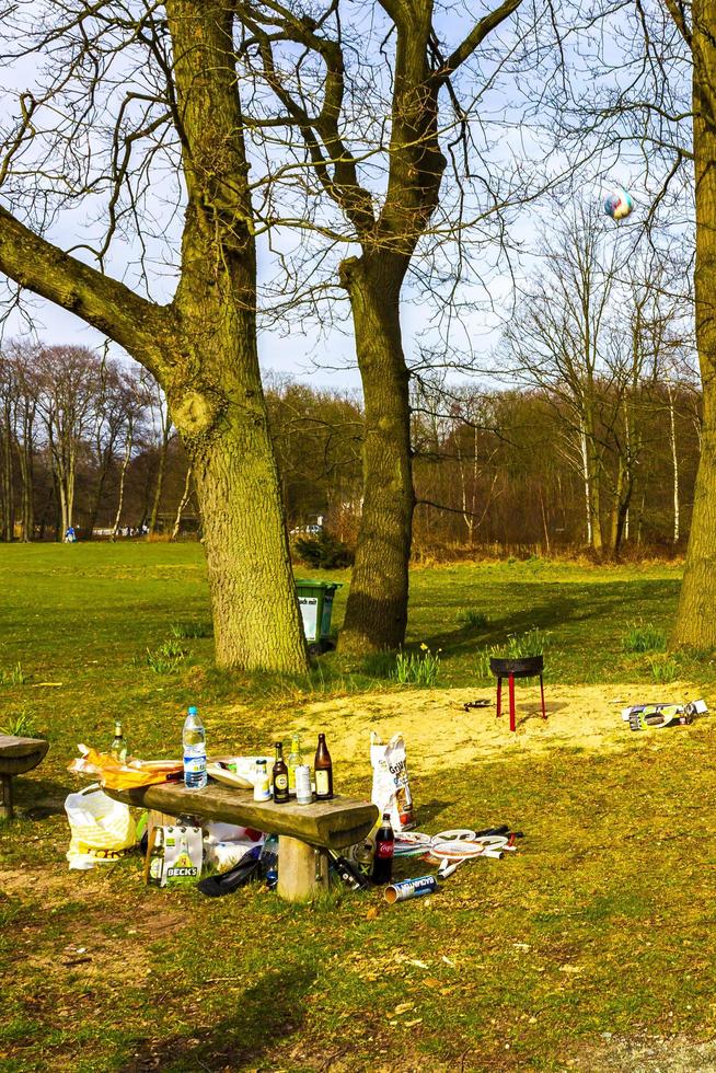 Bremerhaven Bremen Germany 2011 Teenagers play volleyball in park on grass in Germany. photo