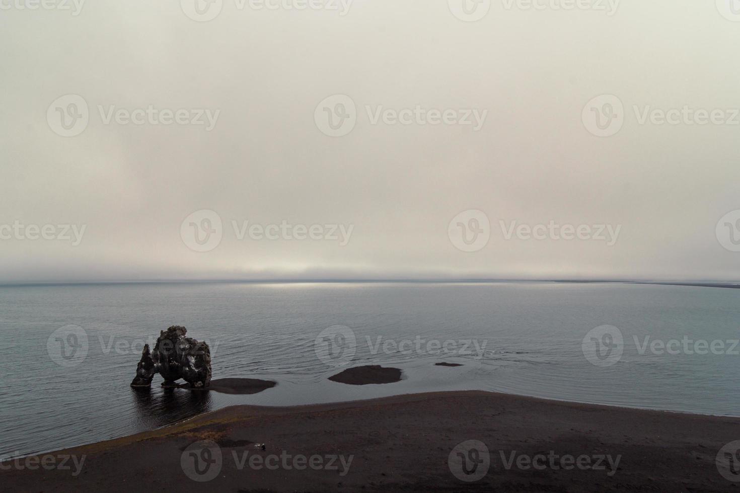 Hvitserkur rock on sea beach landscape photo