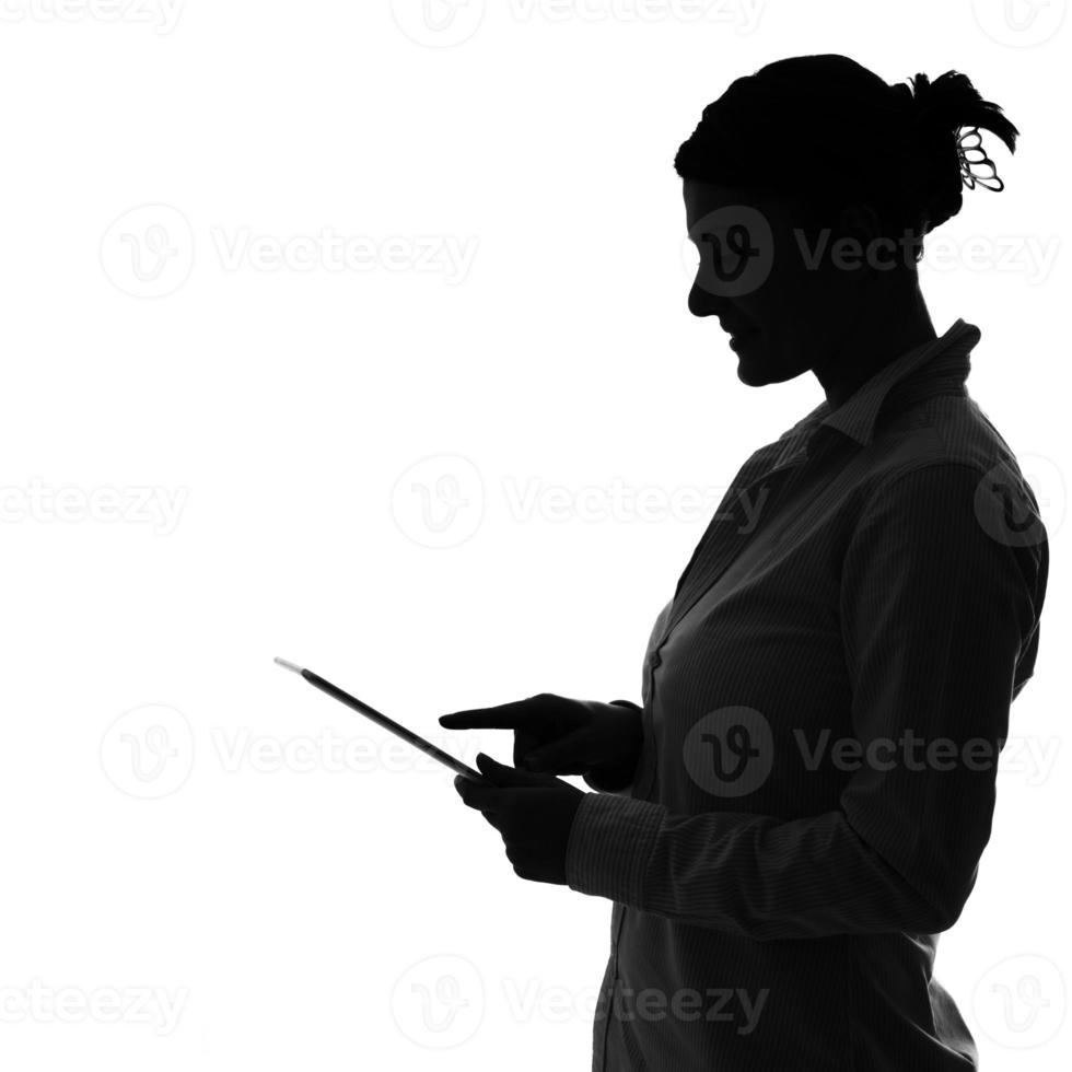 Business woman holding a tablet device photo