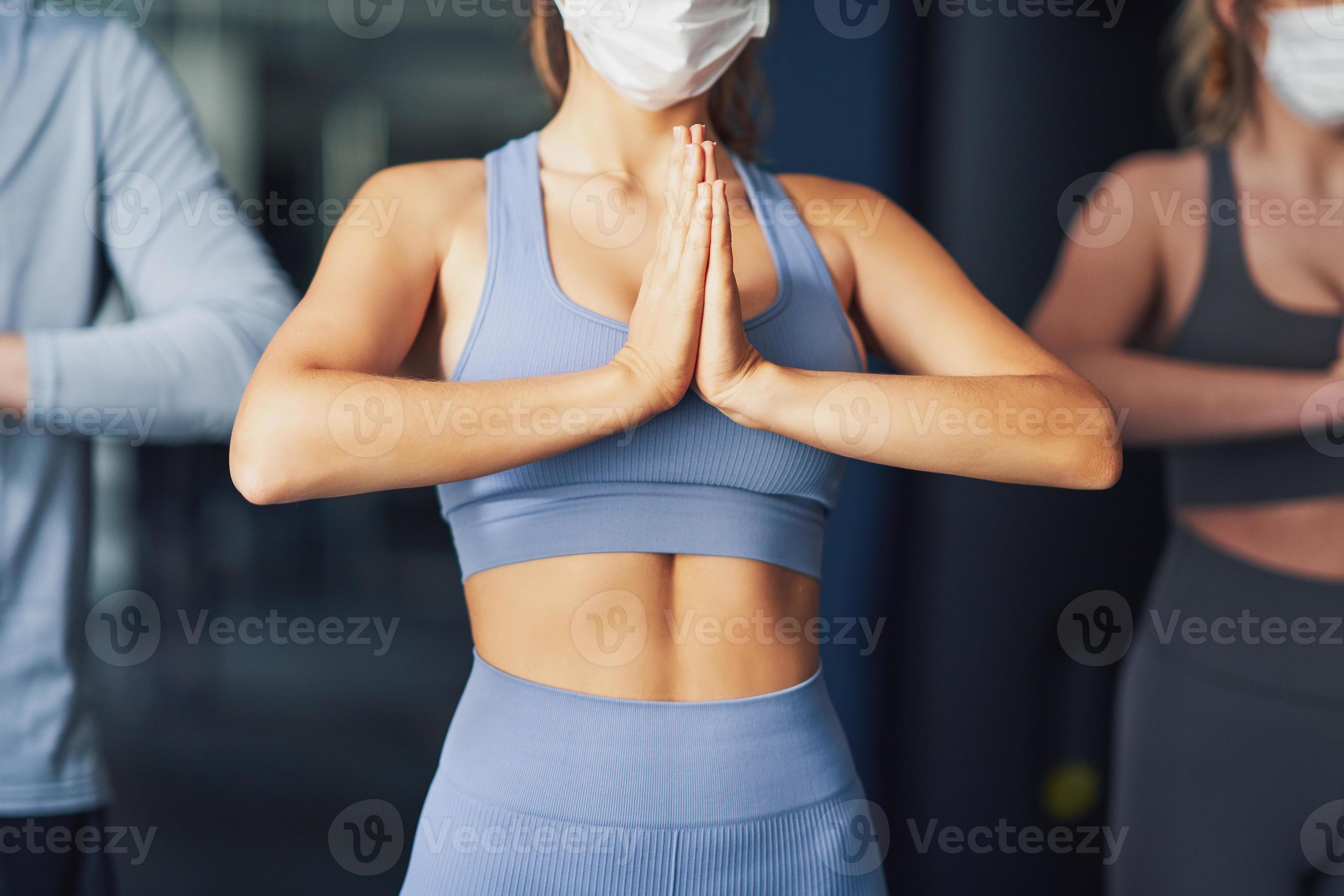 Group of people wearing masks working out in a gym 16576107 Stock Photo