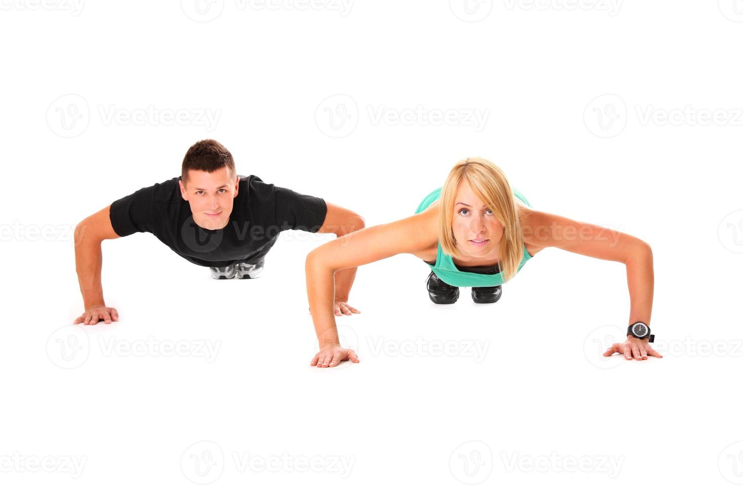 Woman with personal trainer photo