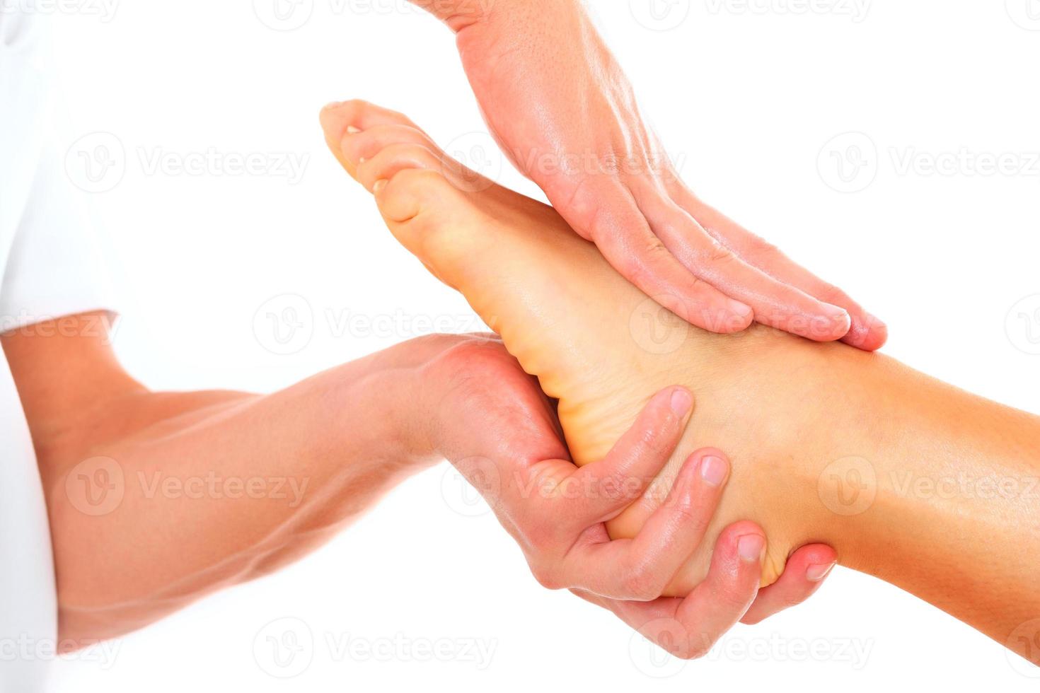 Foot massage therapy photo
