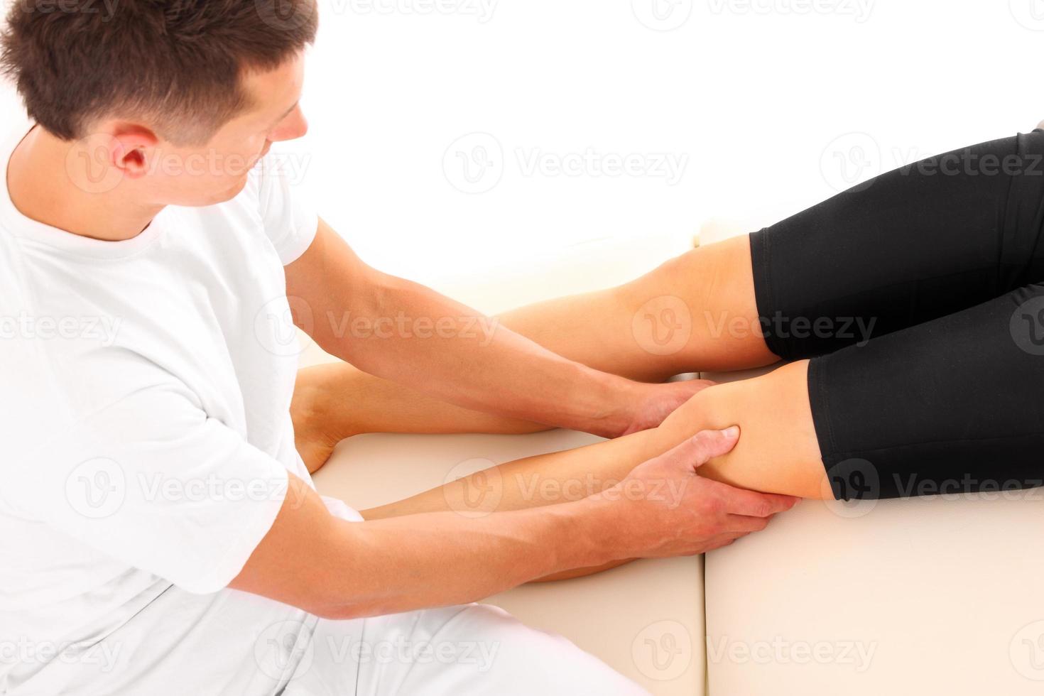 Leg massage therapy photo