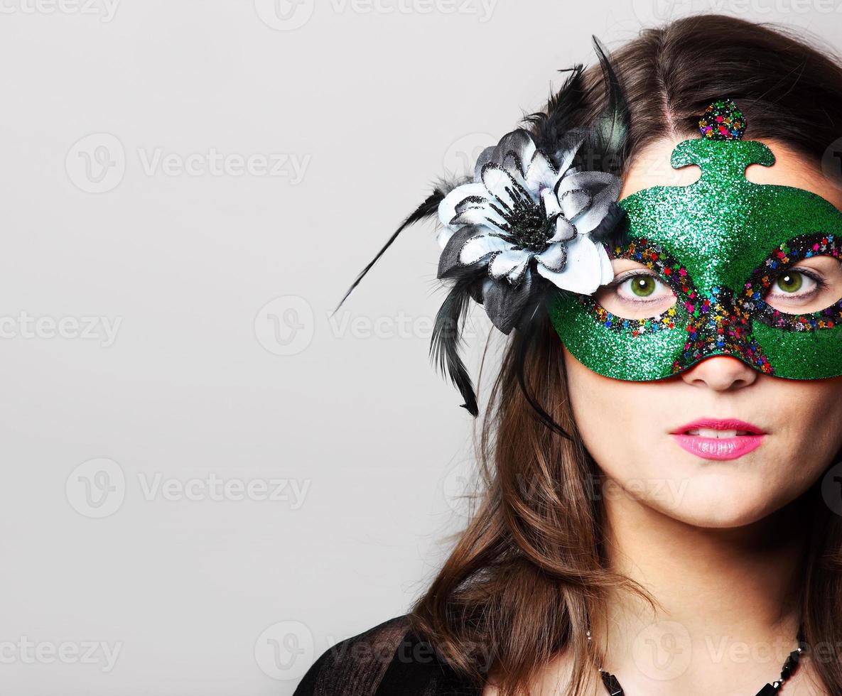 Woman with carnival mask photo