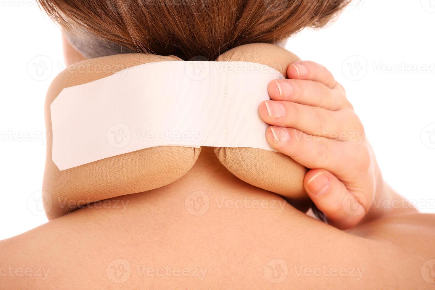 Woman with neck pain photo