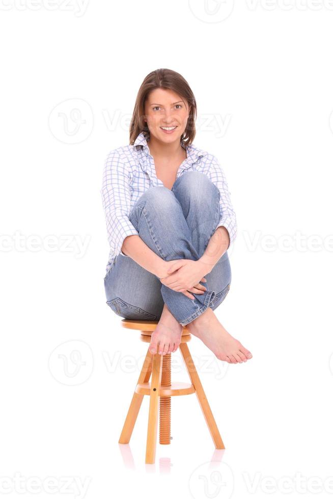 Woman sitting on the bench photo