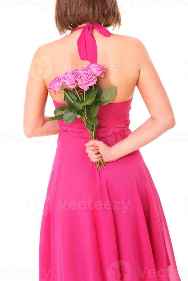 mujer con rosas rosadas foto