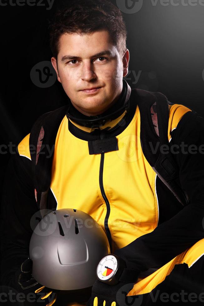 Man with skydiving gear photo