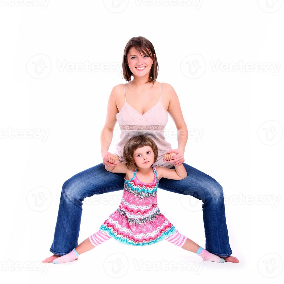 Doing splits on white background photo