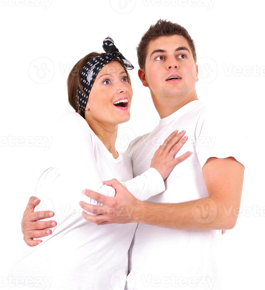 Surprised couple on white background photo