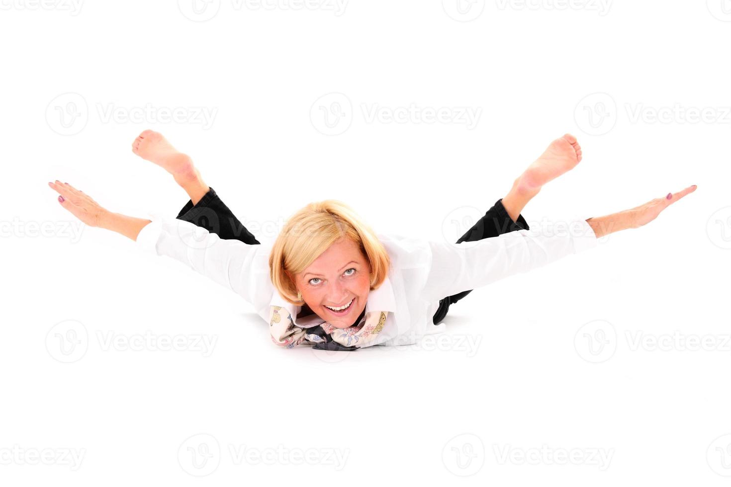 Flexible woman on white background photo