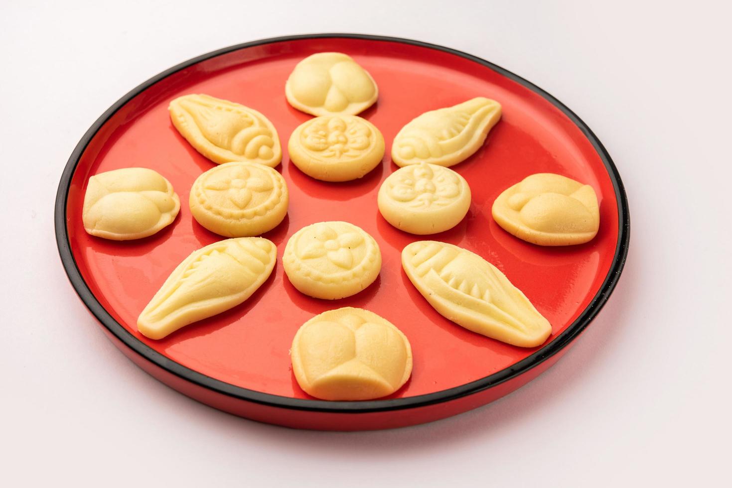 Sandesh or shondesh is a dessert, originating from the Bengal, India, created with milk and sugar photo