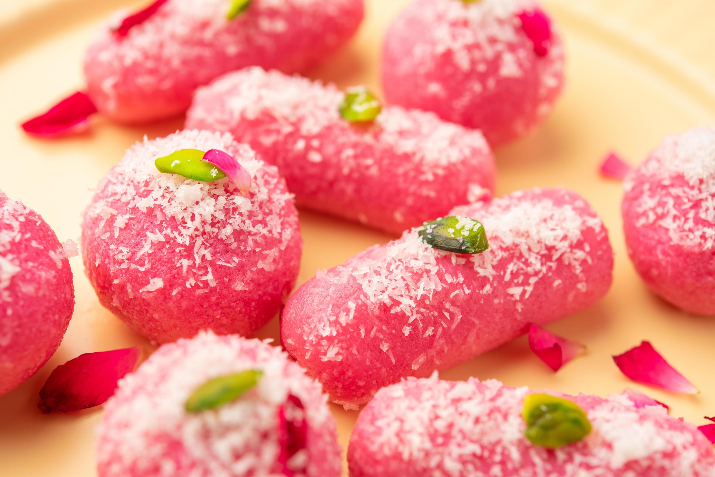 Pink Chumchum or rose flavoured chum chum or cham cham, indian and