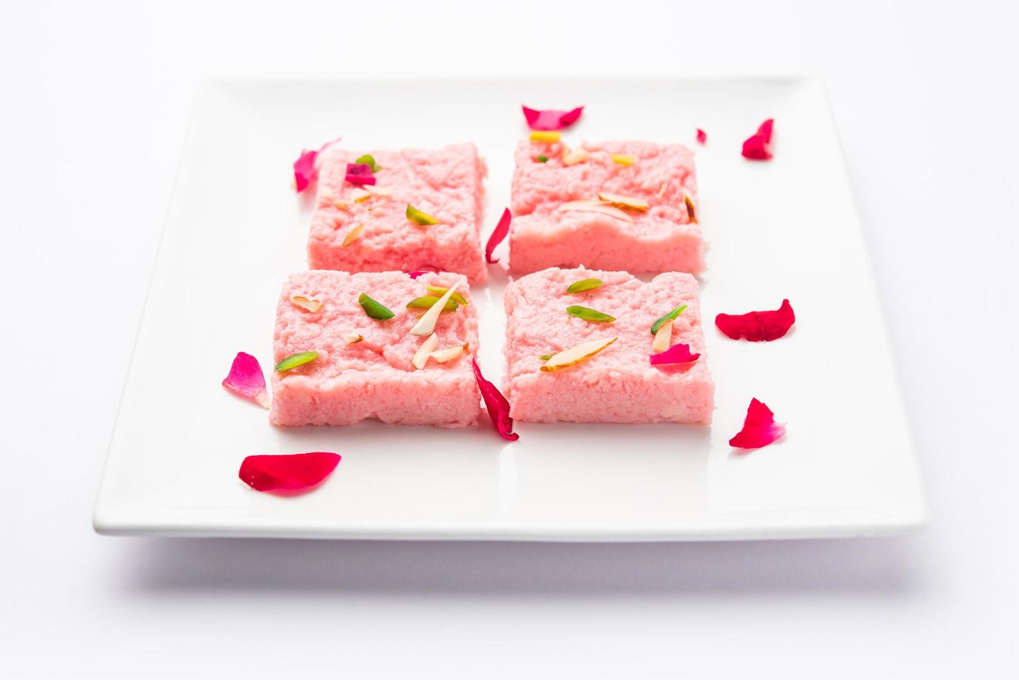 Rose Kalakand pink barfi or burfi also known as flavoured Mishri Mava Or Khoa Milkcake mithai photo