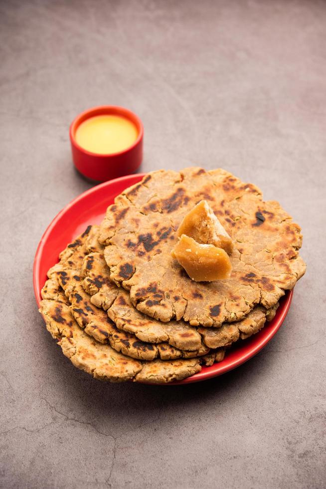 Sweet roti made out of rice flour, jaggery, and ghee. Gud ki roti. gur