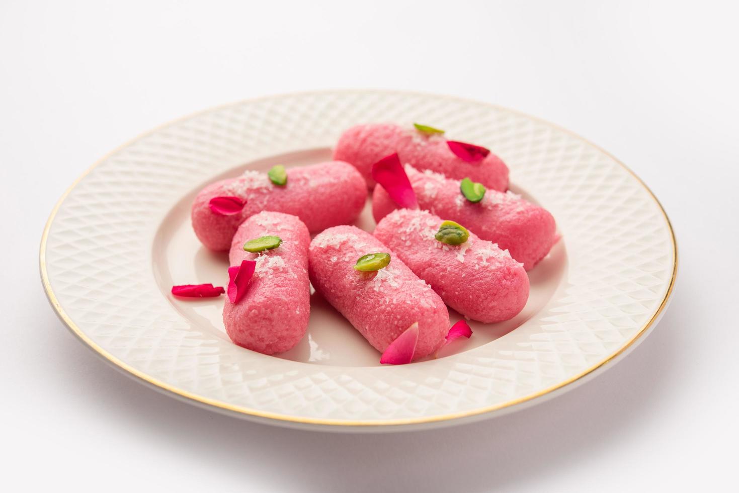 Pink Chumchum or rose flavoured chum chum or cham cham, indian and