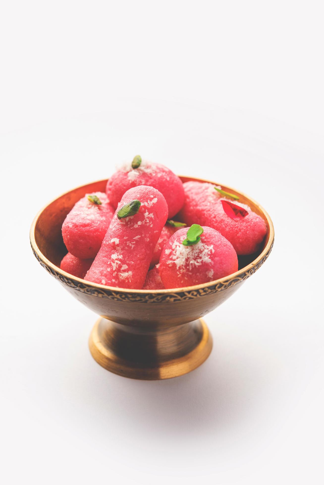 Pink Chumchum or rose flavoured chum chum or cham cham, indian and