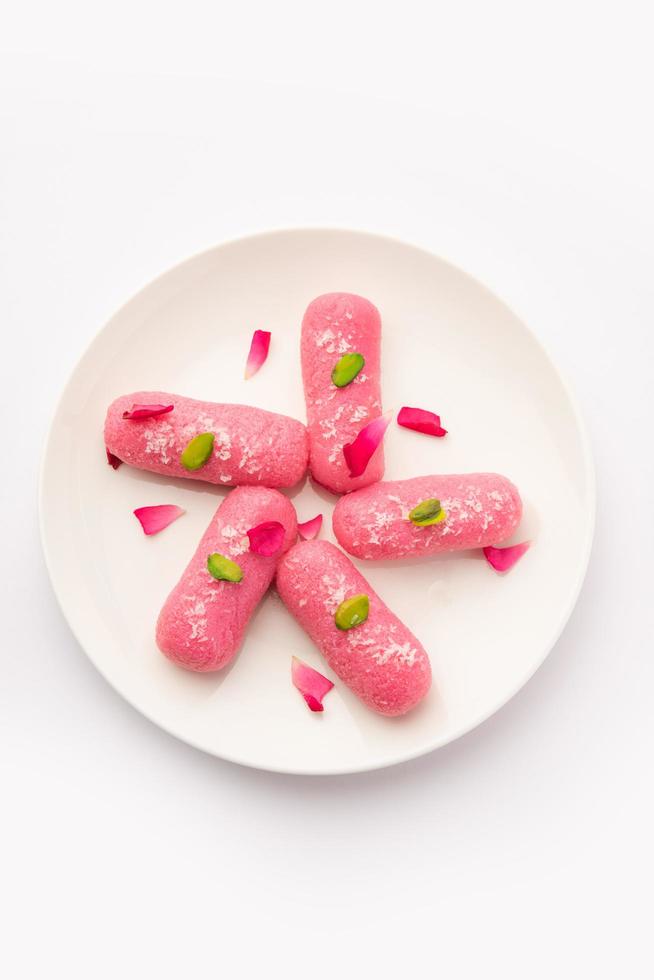 Pink Chumchum or rose flavoured chum chum or cham cham, indian and