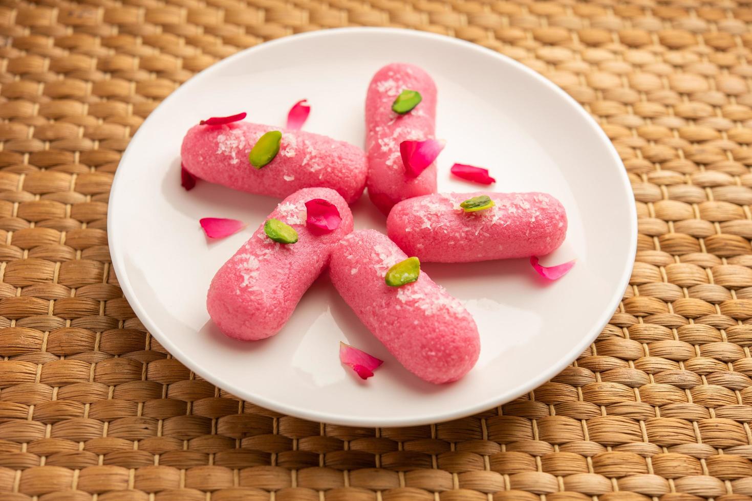 Pink Chumchum or rose flavoured chum chum or cham cham, indian and