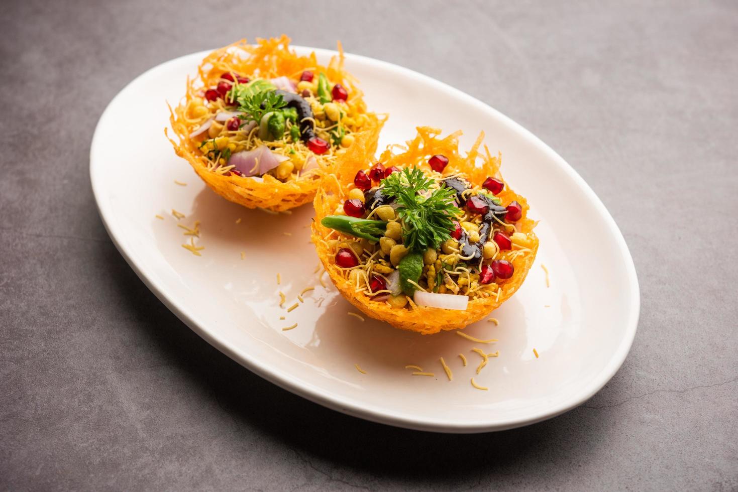 Aloo Tokri Chaat or Potato Basket stuffed chat or katori chat photo