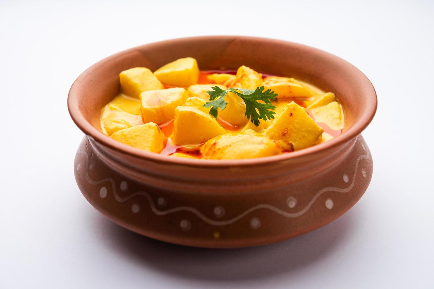 Dahi Aloo sabzi or curd potato curry photo