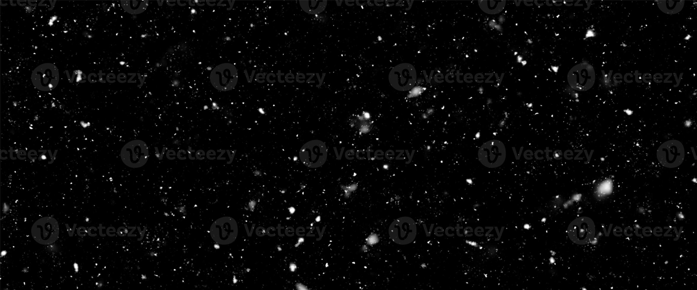 Falling snow flakes, Flying dust particles on a black background. Abstract winter background. Winter landscape with falling shining beautiful snow. photo