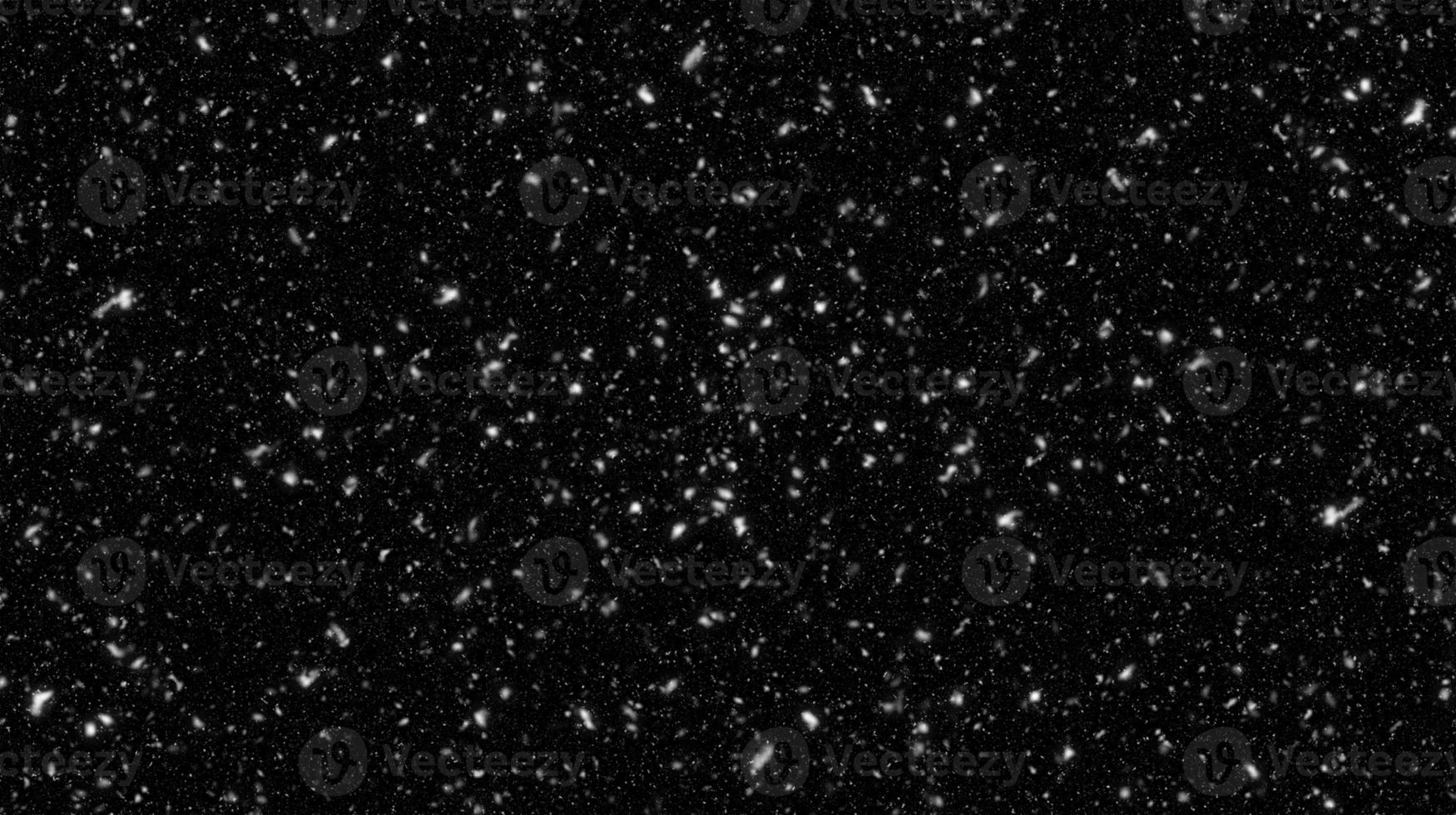 Falling snow flakes, Flying dust particles on a black background. Abstract winter background. Winter landscape with falling shining beautiful snow. photo